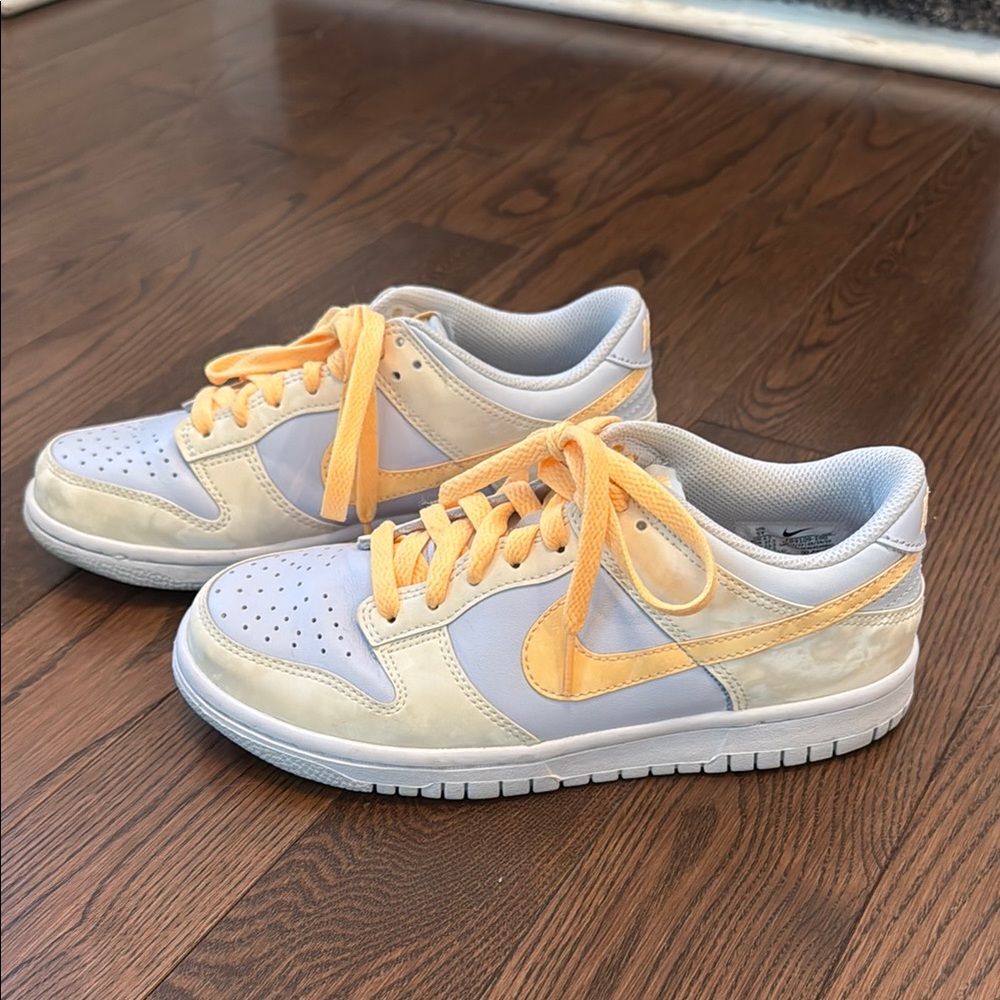 Nike Orange and White Athletic Shoes with Classic Design